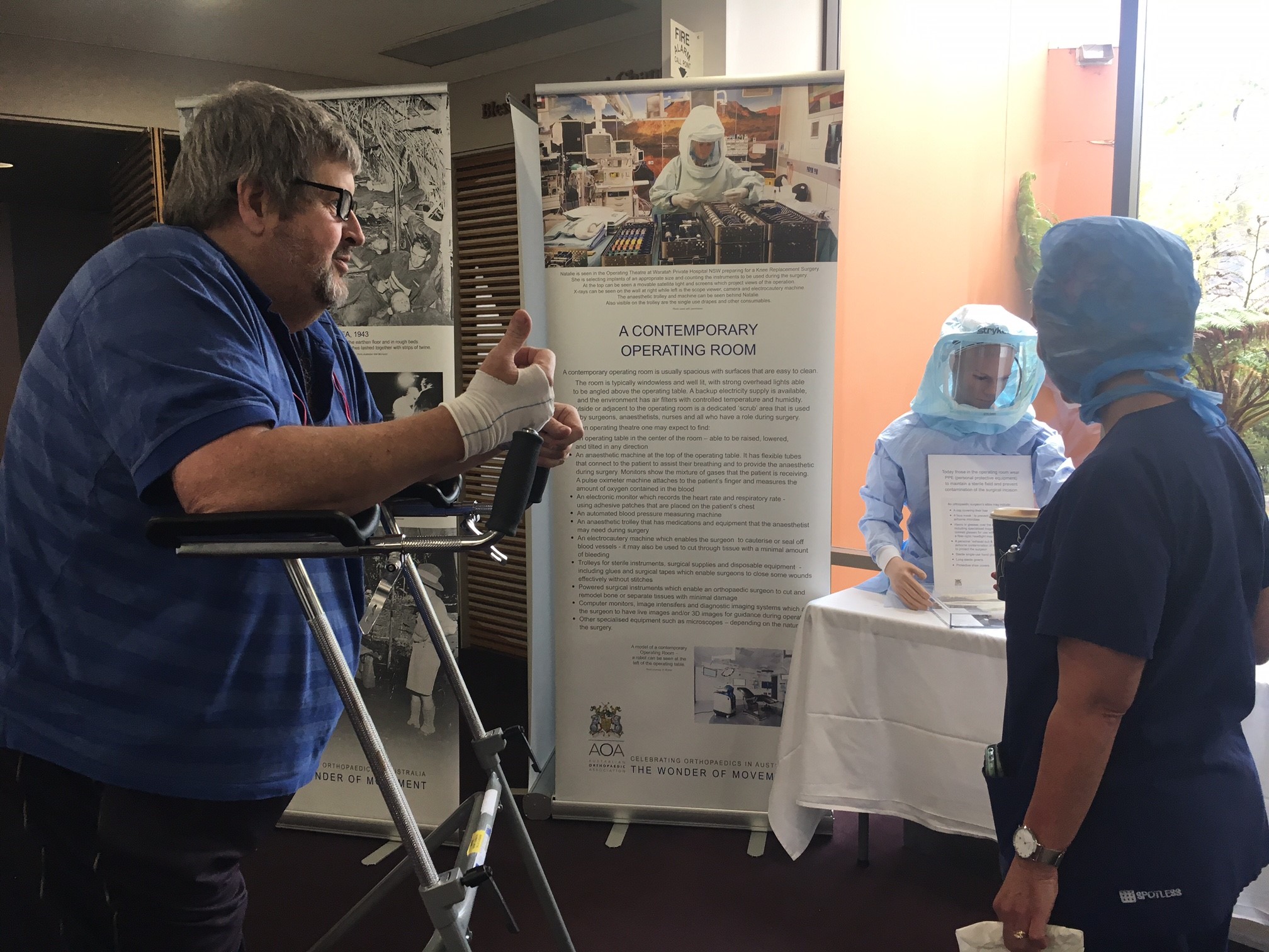 Patient and staff member discuss the contemporary operating theatre