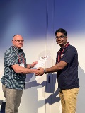15-Winnerofthebestpaper-RajendraShettyproudlyreceiveshiscertificatefromDrBruceFoster
